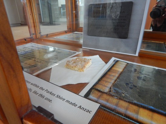 Anzac biscuit (or some in the Parkes shire called them Anzac tiles) along with the recipe and eating suggestions. The Anzac biscuit was a three meals into one super food, and quite different from the biscuit that gets made today (both commercially and homemade). While it is enclosed and cannot be touched, this Anzac biscuit is quite tough and definitely not a chewy snack. Items on loan courtesy of Parkes Historical Society.