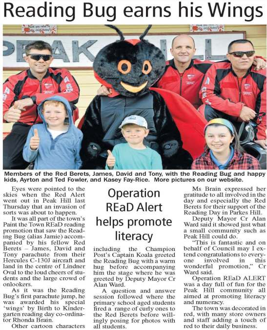 Members of the Red Berets who parachuted onto Lindner Oval. They are joined with the Reading Bug and happy residents - just three of the hundreds of residents who turned out to witness this amazing spectacle. Source: Parkes Champion Post Monday, September 1, 2014