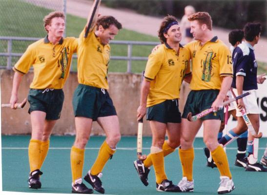Celebrating another Stephen Davies goal for the Kookaburras. Undated photograph courtesy of John and Brenda Davies.