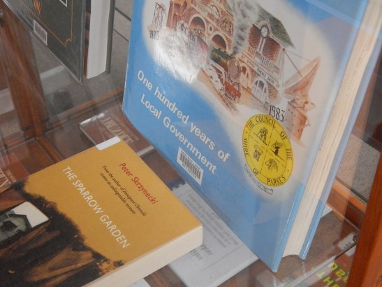 The stories of neighbours - both good and bad experiences - are detailed in a number of books. This photograph highlights some of the resources that can be found in Parkes Library's Family & Local History room. Photograph by Dan Fredericks (Parkes Library) taken September 2, 2016