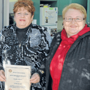 Darelle Whiney (left) with nominator, Shirley Russell. Source: Parkes Champion Post Wednesday July 11, 2012 page 8
