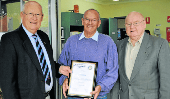 Rotary president, Peter Woods (left), with nominated Robert Irving (centre) and his nominator, Bernie Crowe (right). Source: Parkes Champion Post 7 June 2013