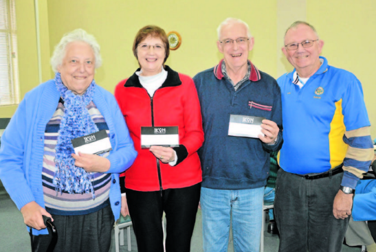 Nominator Judy Thornton with her Good Neighbours Muriel and Graham Lancaster presented with their Ikon Restaurant vouchers by Rotarian president Col Offner. Source: Parkes Champion Post 22 June 2015