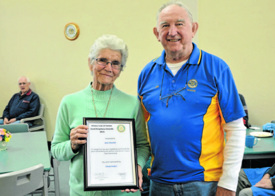 Joan Rauchle - nominated as a Good Neighbour - standing with Rotarian, Cliff Cowell. Source: Parkes Champion Post 22 June 2015