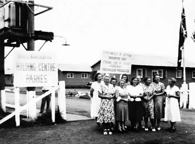 Photograph of Parkes Migrant Camp - sometimes called Parkes Holding Centre and the Migrant Hostel - with a group of ladies posing for the camera. Source: Culture Victoria website