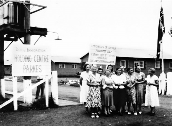 Photograph of Parkes Migrant Camp - sometimes called Parkes Holding Centre and the Migrant Hostel - with a group of ladies posing for the camera. Source: Culture Victoria website