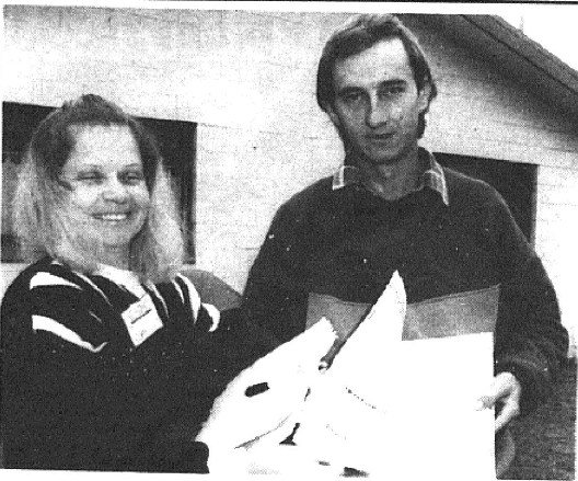 Newspaper photograph showing Census collector, Dorelle Grady leaving a Census form with Bob Nelson. Source: Parkes Champion Post Monday August 5, 1991 page 3