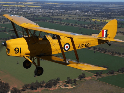 Photograph of de Havilland .82 Tiger Moth. The DH.82 were the planes that all training pilots in Australia would have flown. The yellow markings indicate that it was a trainer during World War II. Source: Temora Aviation Museum website
