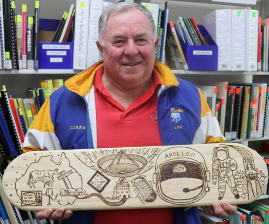 Local artist, Csaba Belley, tried his hand at some pyrography with the Dish and the moon landing as his inspiration. Photograph taken by Dan Fredericks (Parkes Shire Library) on July 15, 2019